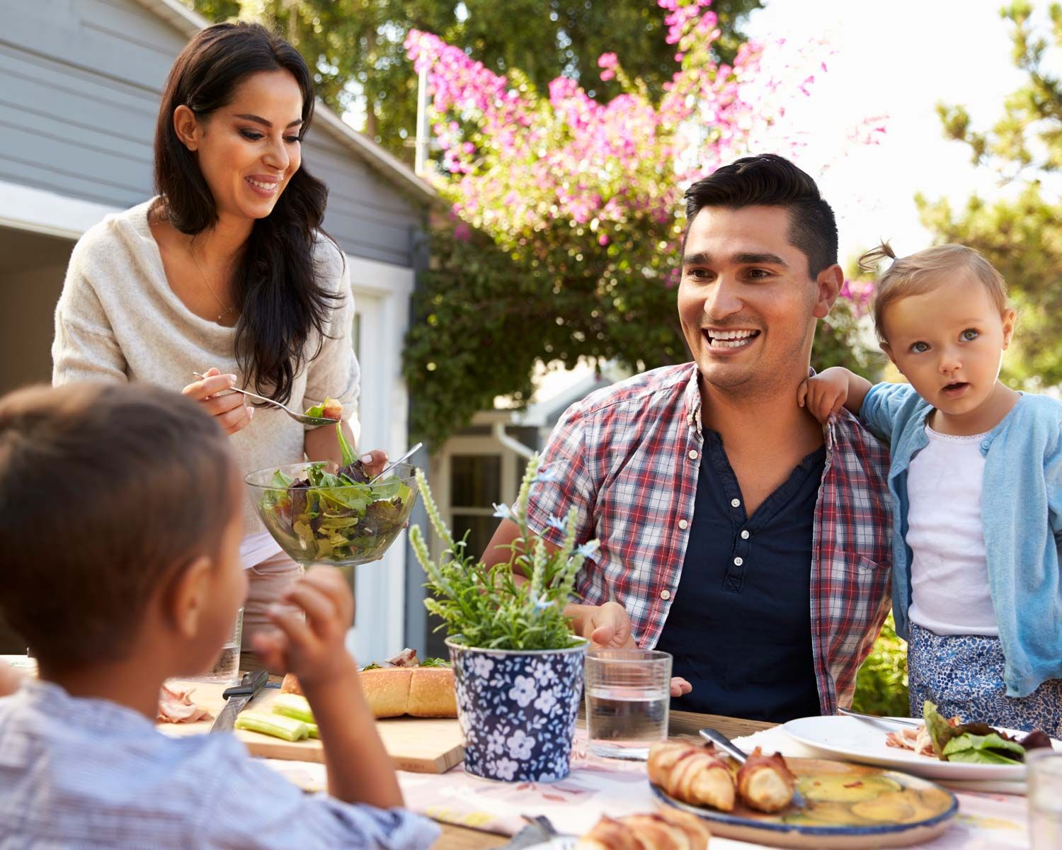 Family eating dinner outside